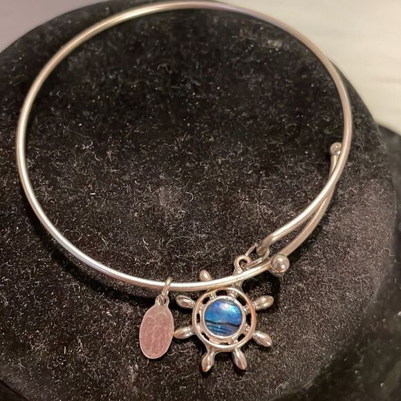 7.5” silver tone bangle bracelet with silver tone nautical charm - Picture 3 of 10